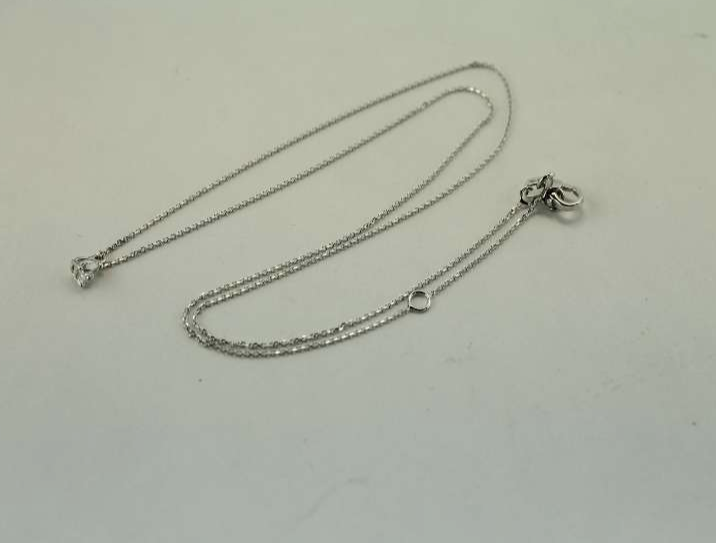 Collier or blanc et diamant